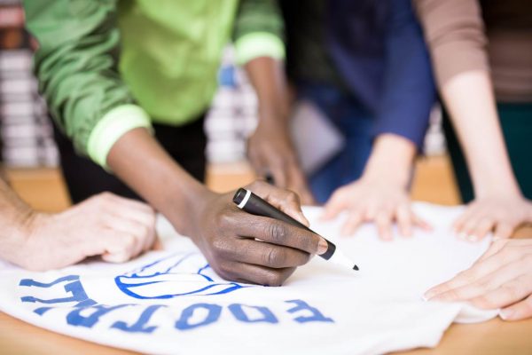 football-player-signing-t-shirt